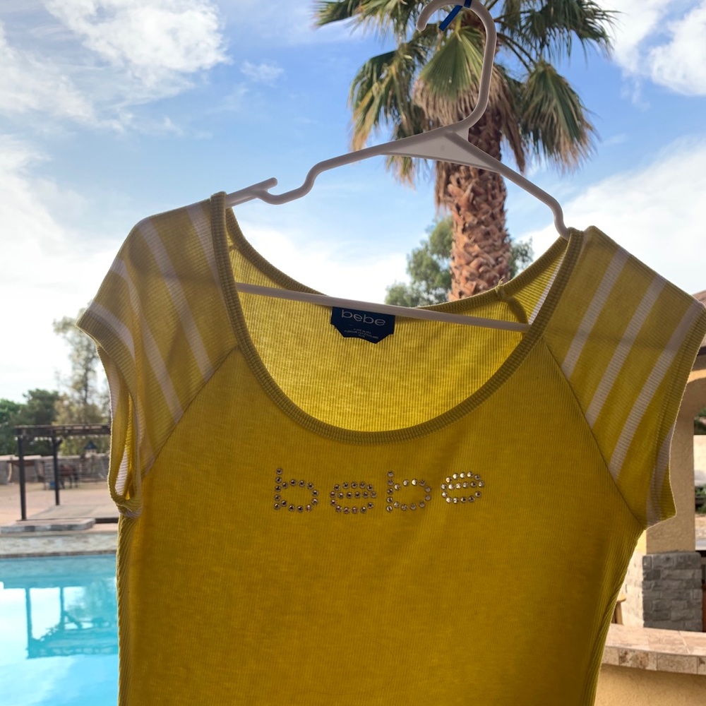 Bebe top yellow. Great for stage summer!